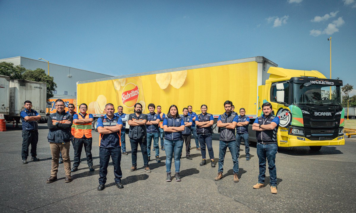 Group of PepsiCo associates standing in front of a Sabritas truck