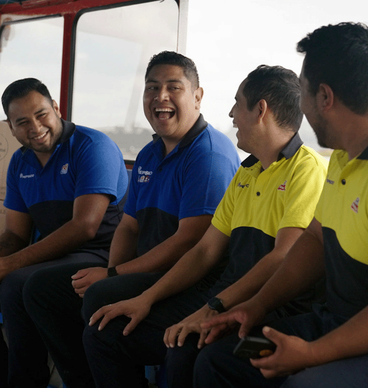 Employees laughing together